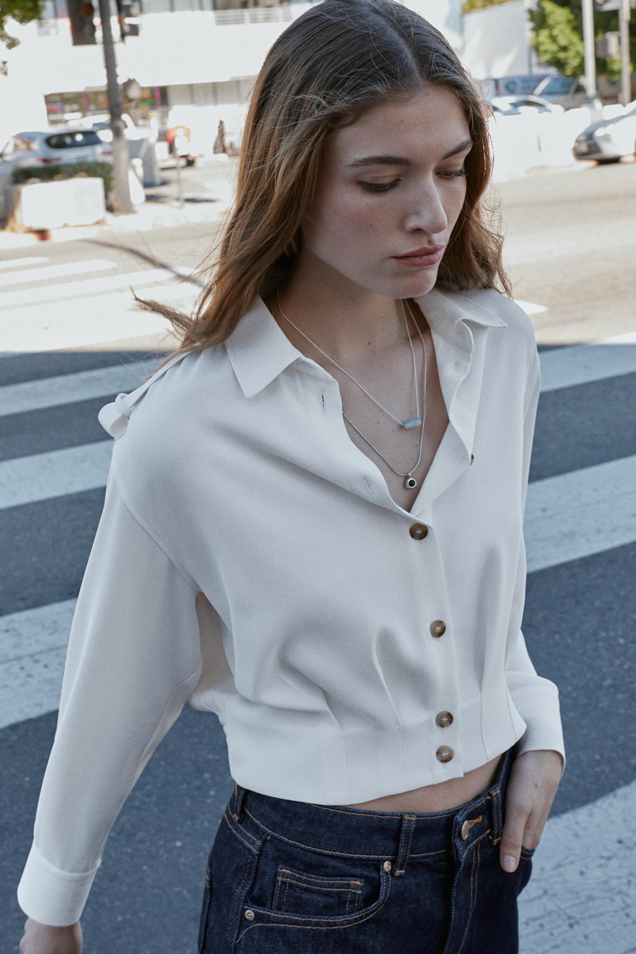 CHEMISE COURTE À PATTES D'ÉPAULES